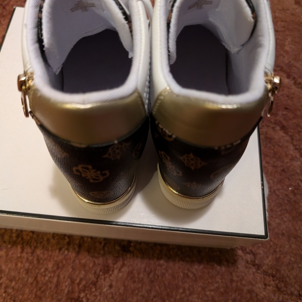 Guess wedge shoes.